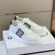 Givenchy G4 Leather Trainers Pair View in white and black Pair of Givenchy G4 Leather Trainers In White And Black sitting on shoe box