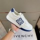 Givenchy G4 Low Top Leather Trainer In White And Blue held at an angle showing side logo