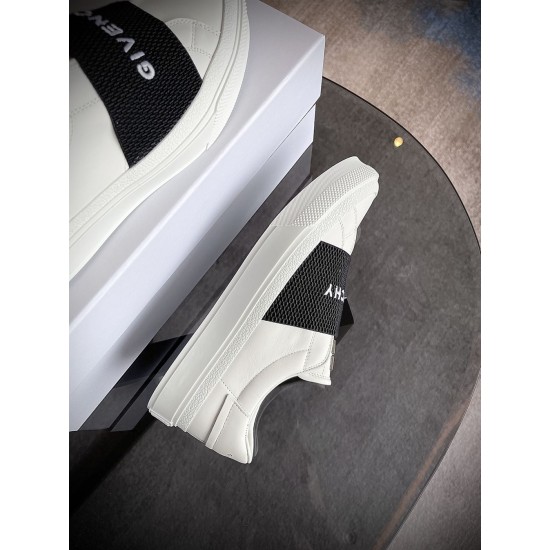 Givenchy White Trainer on Box View in white and black Givenchy white leather trainer resting on a shoe box showing side profile in white and black