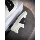Givenchy White Trainer on Box View in white and black Givenchy white leather trainer resting on a shoe box showing side profile in white and black