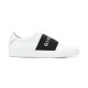 Givenchy White Leather Trainers Side View in white and black Givenchy white leather trainers side profile view showing black logo elastic strap