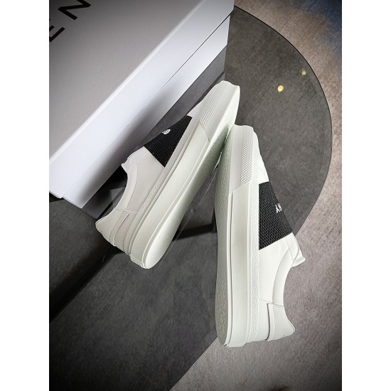 Givenchy White Trainers Side Profile Pair in white and black Pair of Givenchy white leather trainers turned on their side showing outsole profile in white and black