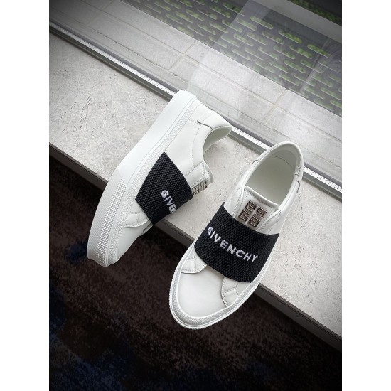 Givenchy Elastic Logo Trainers View in white and black Givenchy white trainers arranged on a marble surface showing low-top cut in white and black