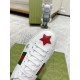 Top-down view of toe box and laces on white Gucci Ace Embroidered Trainer with red metallic star in white and green