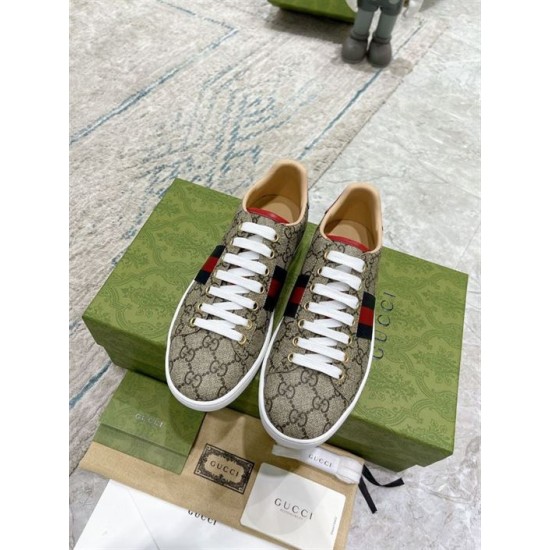 Gucci Ace GG Supreme Canvas Web Stripe Trainers Pair Overhead View in beige and brown Top-down view of Gucci Ace GG Supreme Canvas Web Stripe Trainers pair with white laces in beige and brown