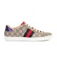 Gucci Ace GG Supreme Canvas Web Stripe Trainers Profile View in beige and brown Profile shot of Gucci Ace GG Supreme Canvas Web Stripe Trainers in beige and brown monogram canvas