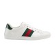 Side view of Gucci Ace Leather Trainers With Web Stripe in white