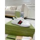 Pair of white Gucci Ace Leather Trainers With Web Stripe on packaging box