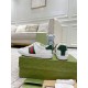 Rear view showing dark green heel tabs on Gucci Ace Leather Trainers With Web Stripe in white