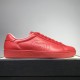 Gucci Ace Red Perforated Leather Trainer Side View in red and white Gucci Ace Red Perforated Leather Trainer side view resting on box in red and white