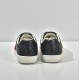 Gucci Ace Embossed Leather Low Top Trainers Black Heel View Back heel view showing embossed branding on Gucci Ace Trainers Black