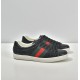 Gucci Ace Embossed Leather Low Top Trainers Black Three-Quarter Angle Three-quarter side angle of Gucci Ace Embossed Leather Low Top Trainers Black