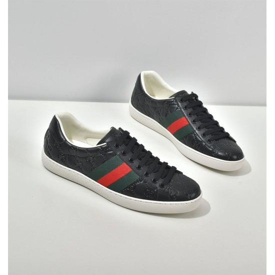 Gucci Ace Embossed Leather Low Top Trainers Black Pair Overview Pair of Gucci Ace Embossed Leather Low Top Trainers Black on white display background
