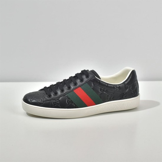 Gucci Ace Embossed Leather Low Top Trainers Black Lateral View Lateral side view of single Gucci Ace Embossed Leather Low Top Trainer Black