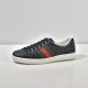 Gucci Ace Embossed Leather Low Top Trainers Black Lateral View Lateral side view of single Gucci Ace Embossed Leather Low Top Trainer Black