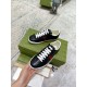 Gucci Ace Black Trainers Pair Display in black and red Angled top view showing both black leather Gucci Ace trainers on green box in black and red