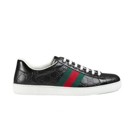 Gucci Ace Black Leather Low Top Trainers in black and red Studio profile shot of black embossed Gucci Ace low top trainers with white laces in black and red