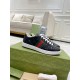 Gucci Ace Black Trainers on Packaging Box in black and red Gucci Ace black low top trainers displayed on a green branded box in black and red