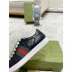 Gucci Ace Black Trainers Heel Detail in black and red Close-up view of the heel counter and green and red web stripe on black Gucci Ace trainers