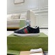 Gucci Ace Black Low Top Trainers Profile in black and red Lateral side view of black embossed leather Gucci Ace sneakers with white cupsole in black and red