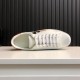 Gucci Ace Disney Mickey Mouse Ivory Trainer Top View in ivory and orange Direct top view of a single Gucci Ace Disney Mickey Mouse ivory trainer with white laces in ivory and orange