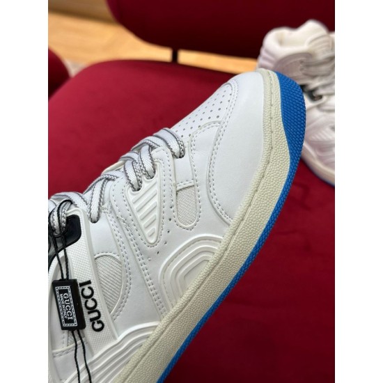 Gucci Basket Trainer Upper Detail in white and blue Detail view of white upper stitching, lace eyelets, and blue outsole edge