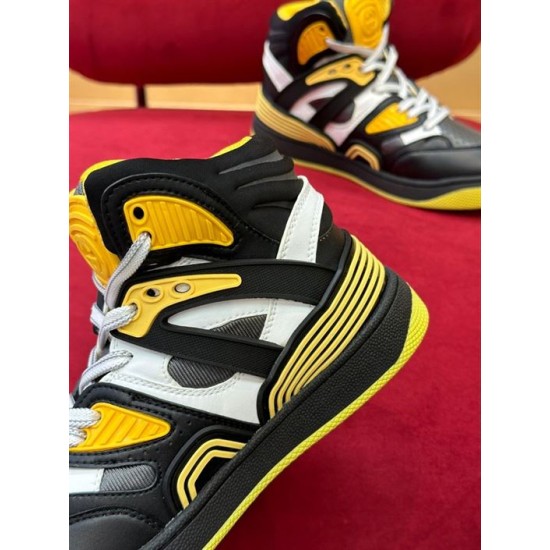 Close-up of padded collar and rubber eyelet overlay on Gucci Basket trainer in black and yellow