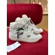 Gucci Basket High Top White Trainers Pair View in white and red Pair of Gucci Basket High Top White Trainers positioned on a red surface