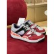 Pair of Gucci Basket High Top Multicolour Trainers displayed on a plush red surface