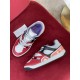 Overhead angle displaying both Gucci Basket high-top trainers and branded tags in multicolour and red