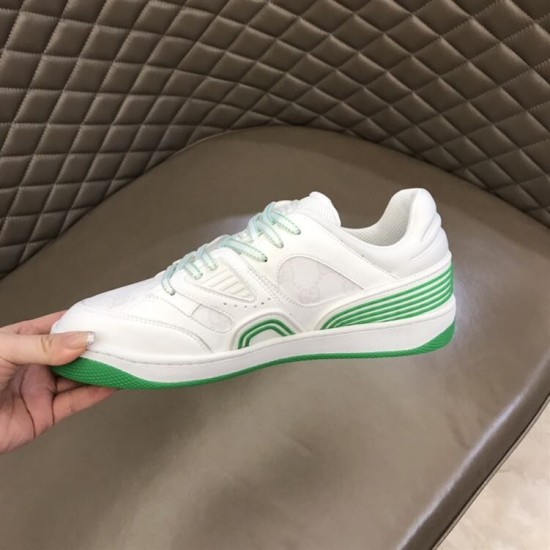 Gucci Basket Trainer Medial View in white and green Medial side view of Gucci Basket white leather trainer in white and green