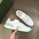 Gucci Basket Trainers Top-Down Angle in white and green Pair of Gucci Basket white and green trainers shown from above
