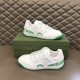 Gucci Basket Trainers Pair Display in white and green Pair of Gucci Basket white and green low-top trainers displayed with box
