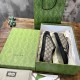 Gucci Low Top Trainers Unboxed in beige and black Gucci GG Monogram Canvas Low Top Trainers stored inside the patterned green shoe box in beige and black