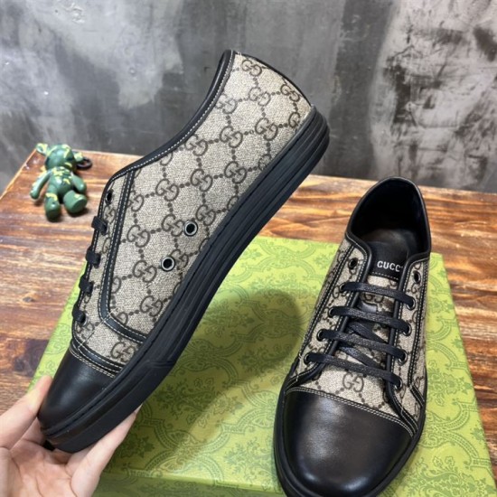 Gucci Monogram Trainers Pair Angled View in beige and black Pair of Gucci GG Monogram Canvas Low Top Trainers shown from an angled top view in beige and black