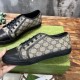 Gucci GG Monogram Canvas Trainer Profile in beige and black Close-up profile of the beige GG canvas and black leather details on the low-top trainer.