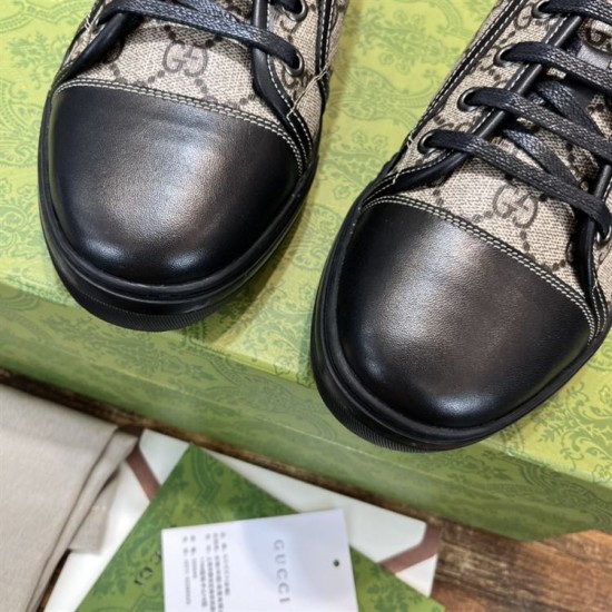 Gucci Trainer Leather Toe Cap Detail in beige and black Detailed view of the smooth black leather toe cap on the beige GG monogram trainer.