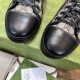 Gucci Trainer Leather Toe Cap Detail in beige and black Detailed view of the smooth black leather toe cap on the beige GG monogram trainer.