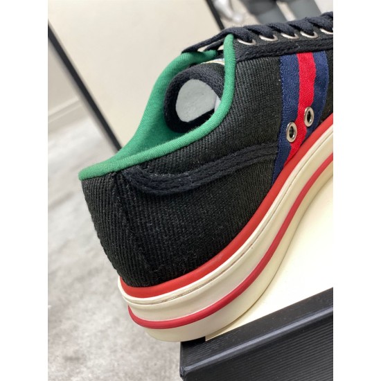 Gucci Black Canvas Webbing Low Top Trainer Heel Detail Close-up of Gucci Black Canvas Webbing Low Top Trainer heel seam and red trim