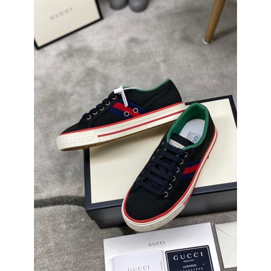 Gucci Black Canvas Webbing Low Top Trainers Pair View Pair of Gucci Black Canvas Webbing Low Top Trainers showing medial and lateral sides
