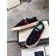 Gucci Black Canvas Webbing Low Top Trainers Pair View Pair of Gucci Black Canvas Webbing Low Top Trainers showing medial and lateral sides