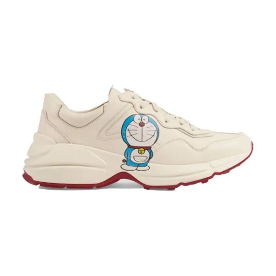 Gucci Rhyton Ivory Leather Trainer Profile View in ivory and red Gucci Rhyton ivory leather low top trainer featuring character print and red sole side profile view