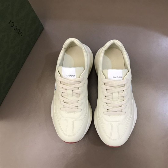 Gucci Rhyton Ivory Trainers Top Down View in ivory and red Top down angle view of Gucci Rhyton ivory leather trainers showing lace up system and tongue label in ivory and red