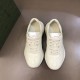 Gucci Rhyton Ivory Trainers Top Down View in ivory and red Top down angle view of Gucci Rhyton ivory leather trainers showing lace up system and tongue label in ivory and red