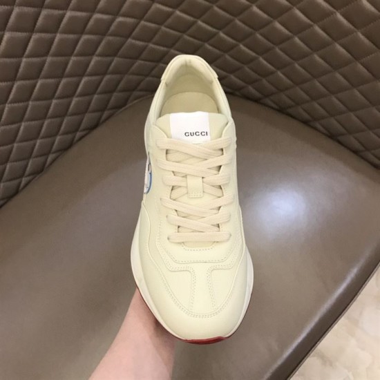 Gucci Rhyton Ivory Trainer Front View in ivory and red Front upper angle view of single Gucci Rhyton ivory leather trainer detailing toe box and laces in ivory and red