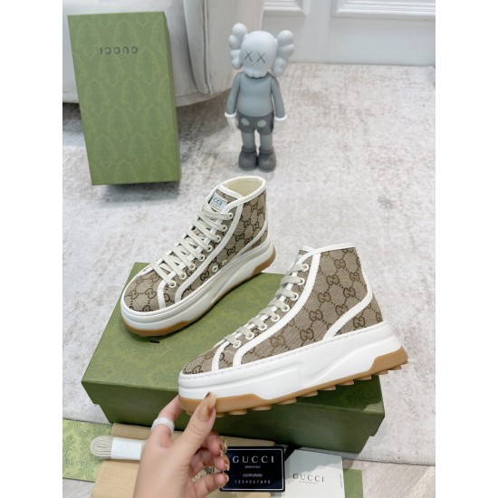 Gucci High Top Beige Canvas Trainer Three-Quarter View in beige and white Three-quarter view of beige Gucci GG high top canvas trainers with chunky platform soles in beige and white