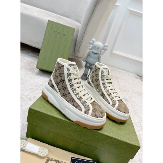 Gucci GG High Top Beige Canvas Trainer Pair in beige and white Pair of Gucci GG High Top Platform Beige Canvas Trainers displayed on a green box in beige and white