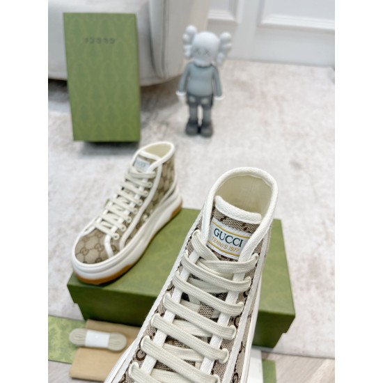 Gucci High Top Beige Canvas Trainer Tongue Detail in beige and white Close-up of tongue patch on Gucci GG High Top Platform Beige Canvas Trainer reading Gucci Tennis 1977 in beige and white
