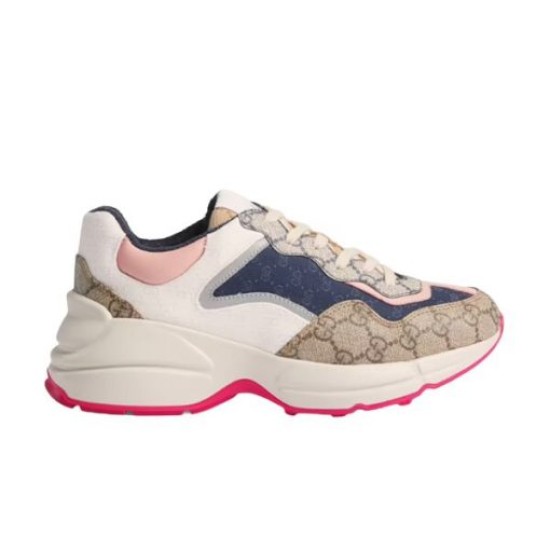 Gucci Rhyton Trainer Studio Profile in beige and pink Studio profile shot of Gucci Rhyton GG canvas trainer on white background in beige and pink