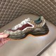 Gucci GG Rhyton Low Top Trainer Medial Profile in beige and brown Medial side view of Gucci GG Rhyton Monogram Canvas Low Top Trainer showing dark brown midsole in beige and brown